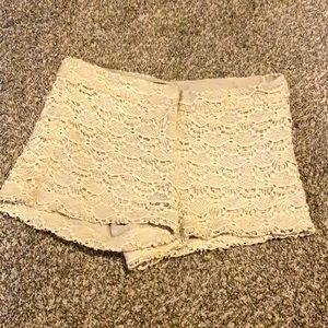 Tan frill express shorts. Mid rise.